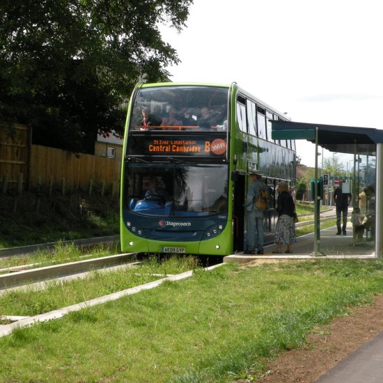 Bus_on_the_Cambridgeshire_Guided_Busway-_in_Impington-_Cambridgeshire-_England.jpg